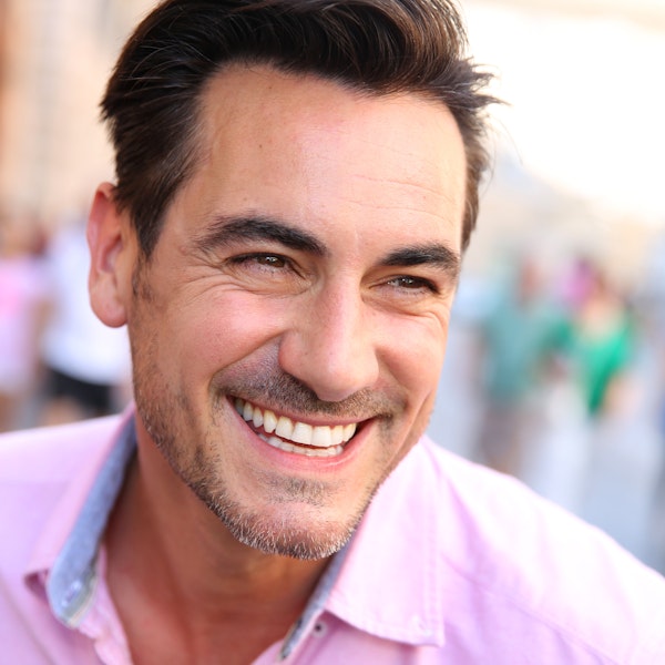 Smiling man with dental veneers