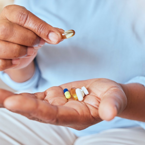 person holding medication