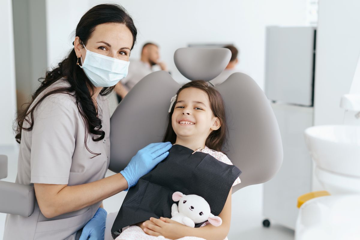 Infant being examined at pediatric dental visit in Albuquerque
