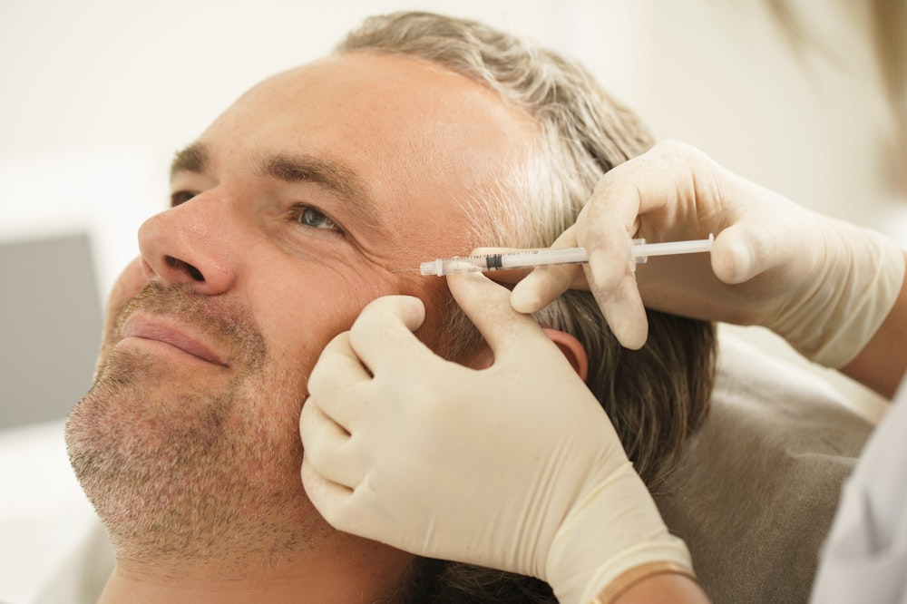 Male patient receiving injectable